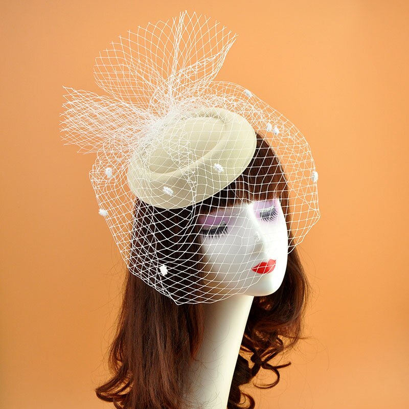 Vanessa fishnet fascinator